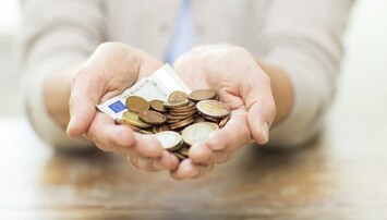 Handen met geld